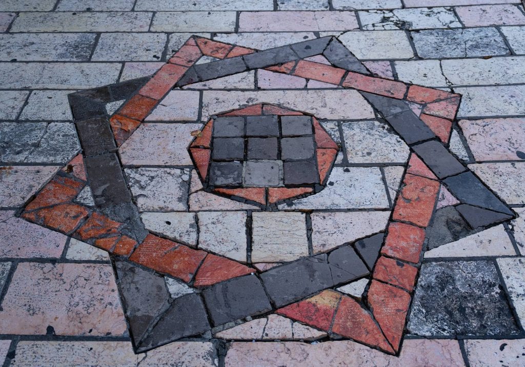 A star pattern set into the paving stones at Damascus Gate, Jerusalem