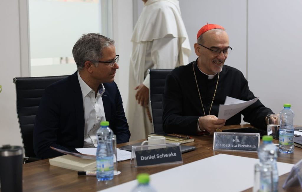 Daniel Schwake and H.B. Cardinal Pizzaballa at a workshop